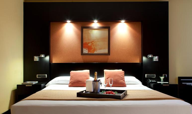 Imagen de la habitación del Hotel Intelier Rosa. Foto 4