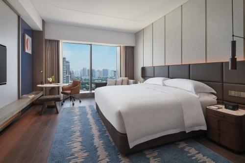 Imagen de la habitación del Hotel InterContinentals Zhengzhou. Foto 11