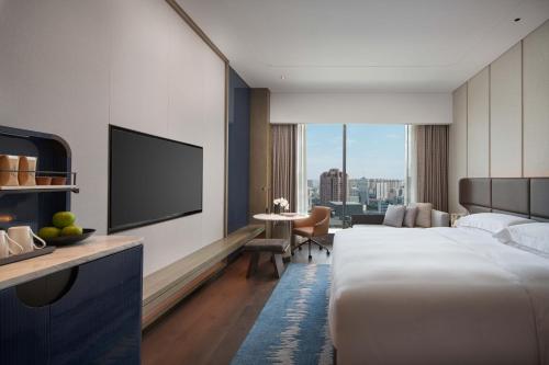 Imagen de la habitación del Hotel InterContinentals Zhengzhou. Foto 13