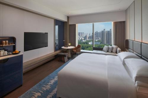 Imagen de la habitación del Hotel InterContinentals Zhengzhou. Foto 14