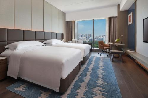 Imagen de la habitación del Hotel InterContinentals Zhengzhou. Foto 18