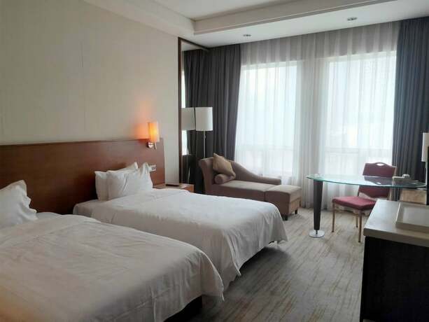 Imagen de la habitación del Hotel Intercity Guangzhou East Railway Station, tianhe. Foto 12