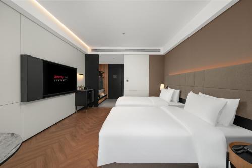 Imagen de la habitación del Hotel Intercity Guangzhou Pazhou Convention & Exhibition. Foto 19