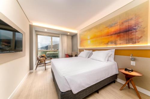 Imagen de la habitación del Hotel Intercity Portofino Florianópolis. Foto 4