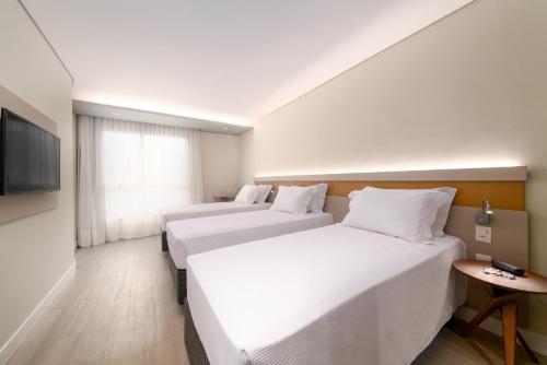 Imagen de la habitación del Hotel Intercity Portofino Florianópolis. Foto 5