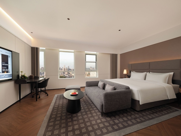 Imagen de la habitación del Hotel Intercity Qingdao Downtown. Foto 1