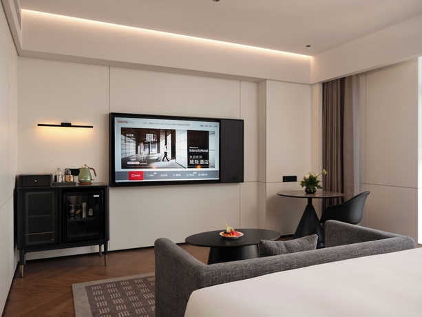 Imagen de la habitación del Hotel Intercity Qingdao Downtown. Foto 2