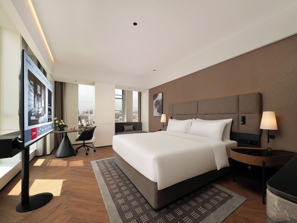 Imagen de la habitación del Hotel Intercity Qingdao Downtown. Foto 4