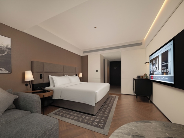 Imagen de la habitación del Hotel Intercity Qingdao Downtown. Foto 5
