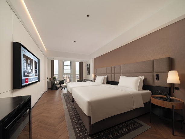 Imagen de la habitación del Hotel Intercity Qingdao Downtown. Foto 10