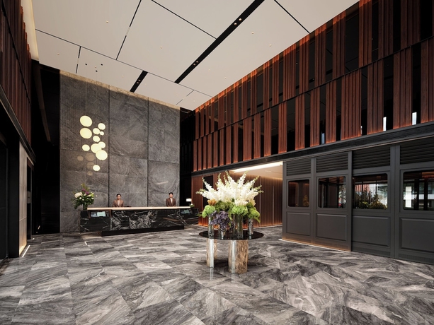 Imagen de los interiores del Hotel Intercity Qingdao Downtown. Foto 16