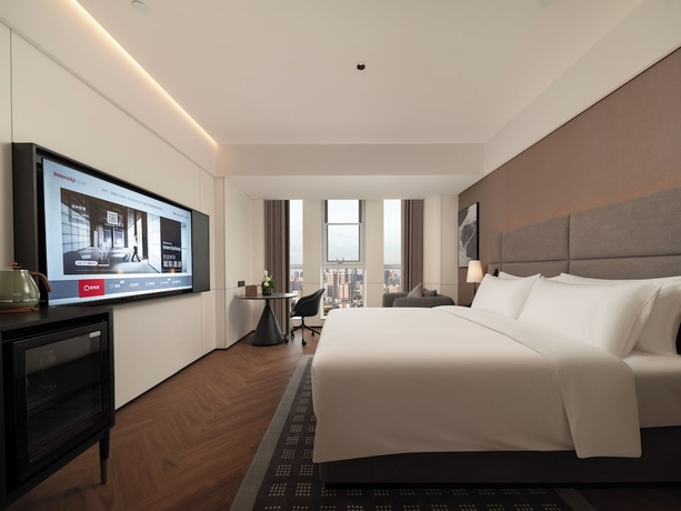 Imagen de la habitación del Hotel Intercity Qingdao Downtown. Foto 11