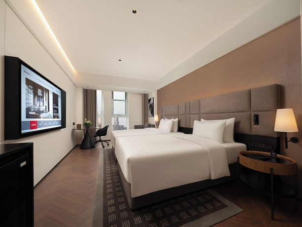 Imagen de la habitación del Hotel Intercity Qingdao Downtown. Foto 12