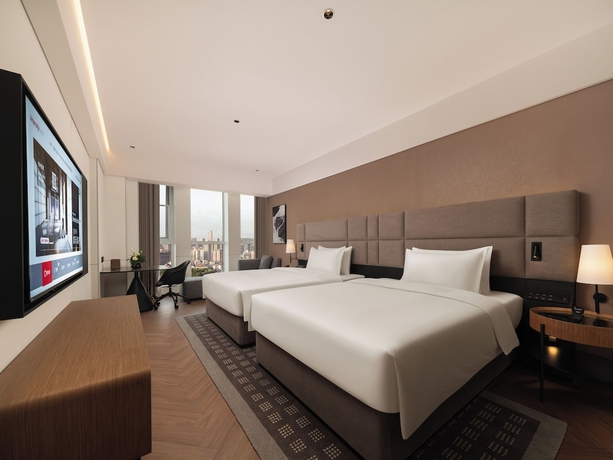 Imagen de la habitación del Hotel Intercity Qingdao Downtown. Foto 13