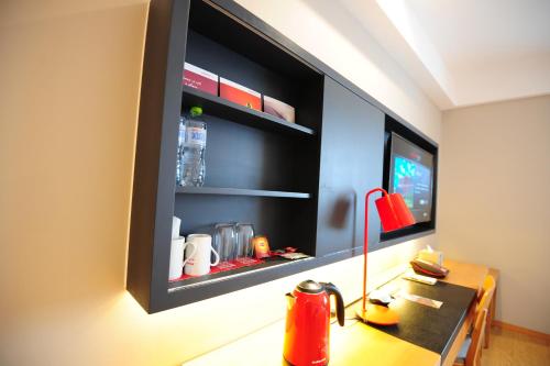 Imagen de la habitación del Hotel Intercity Qingdao. Foto 6