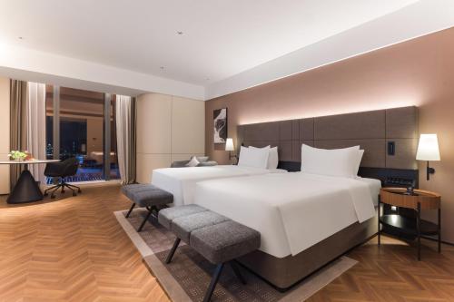 Imagen de la habitación del Hotel Intercity Shanghai Xuhui Binjiang International Media Port. Foto 18