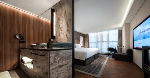 Imagen general del Hotel Intercity Wuhan CADE Optics Valley. Foto 8