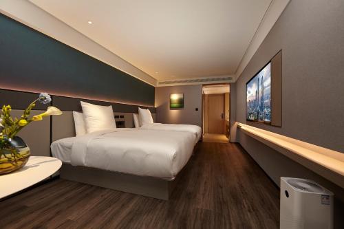 Imagen general del Hotel Intercity Yangzhou Slender West Lake. Foto 7