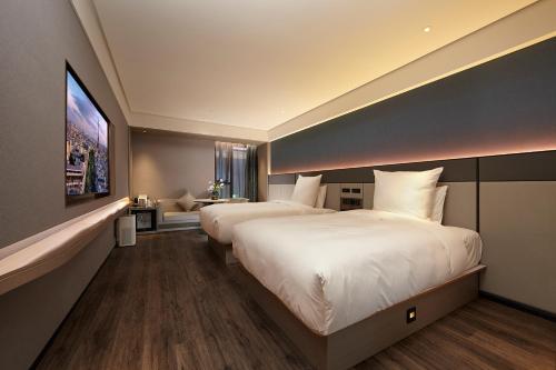 Imagen general del Hotel Intercity Yangzhou Slender West Lake. Foto 9