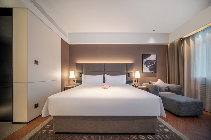 Imagen de la habitación del Hotel Intercity Yantai Downtown. Foto 2