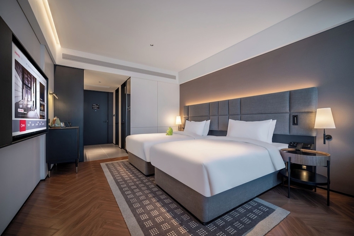 Imagen de la habitación del Hotel Intercity Yantai Downtown. Foto 3