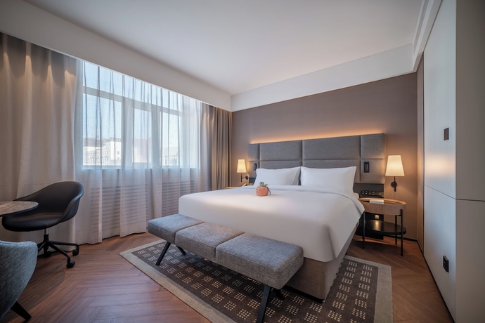 Imagen de la habitación del Hotel Intercity Yantai Downtown. Foto 5