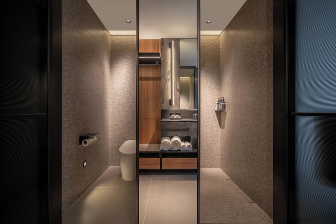 Imagen de la habitación del Hotel Intercity Yantai Downtown. Foto 7