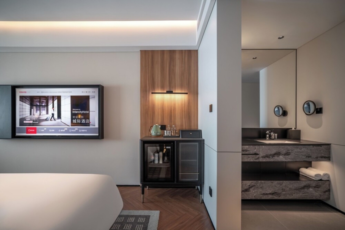 Imagen de la habitación del Hotel Intercity Yantai Downtown. Foto 8