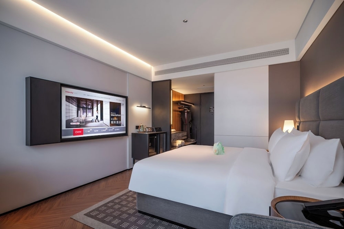 Imagen de la habitación del Hotel Intercity Yantai Downtown. Foto 10