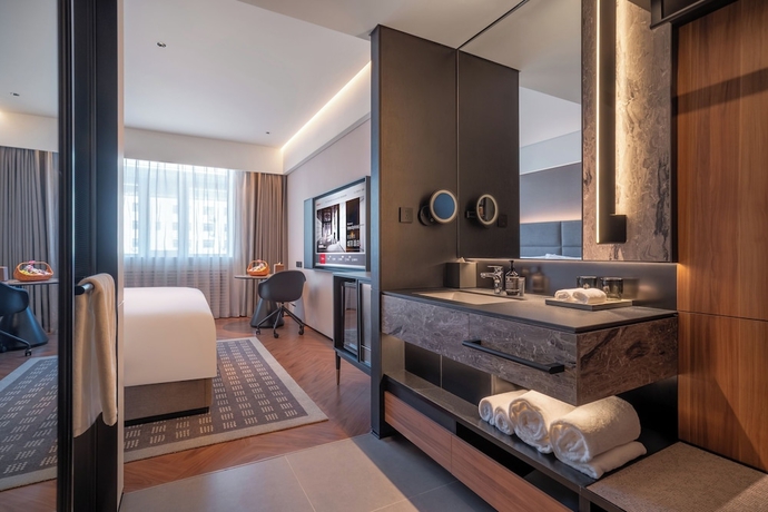 Imagen de la habitación del Hotel Intercity Yantai Downtown. Foto 11