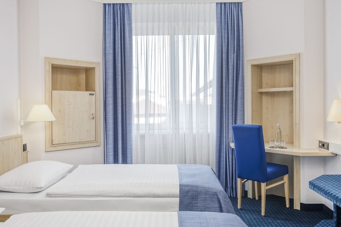 Imagen de la habitación del Hotel Intercityhotel Erfurt. Foto 13