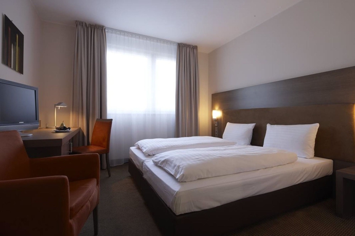 Imagen de la habitación del Hotel Intercityhotel Essen. Foto 11