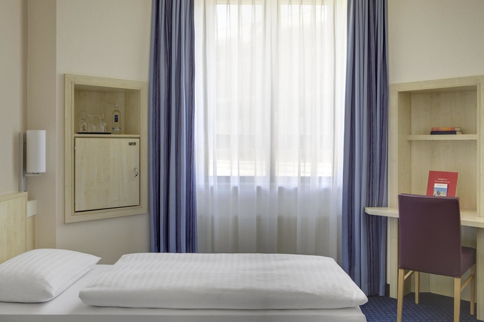 Imagen de la habitación del Hotel Intercityhotel Freiburg. Foto 5