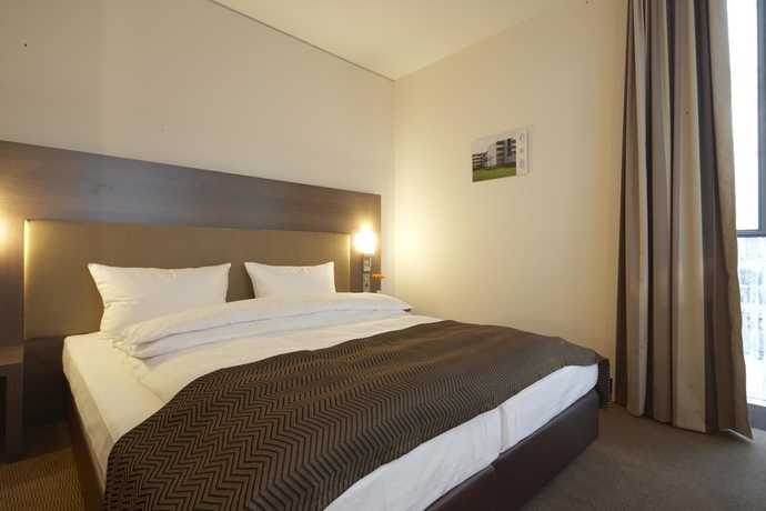 Imagen de la habitación del Hotel Intercityhotel Mannheim. Foto 12
