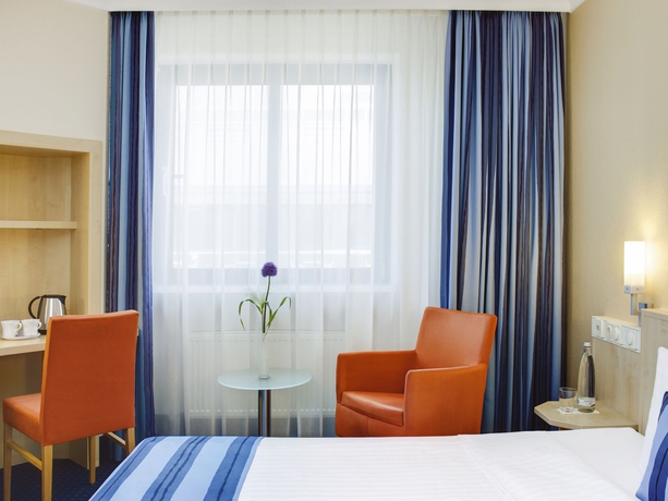 Imagen de la habitación del Hotel Intercityhotel Nürnberg. Foto 6