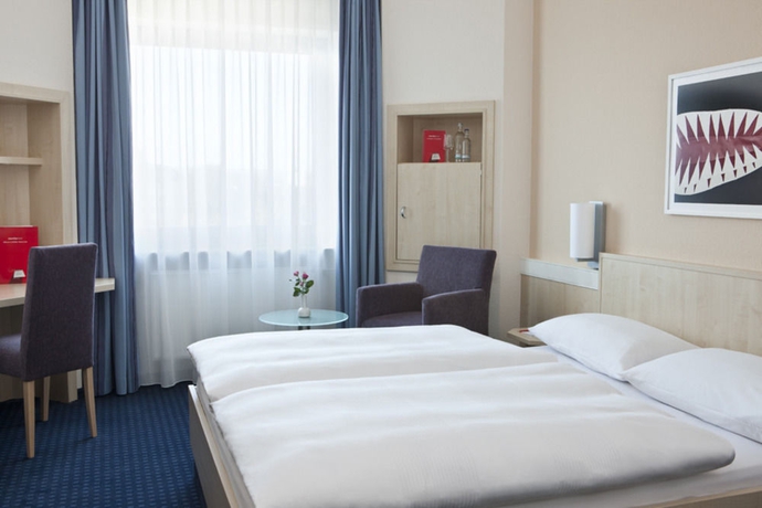 Imagen de la habitación del Hotel Intercityhotel Ulm. Foto 4