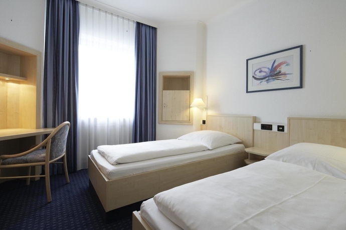Imagen de la habitación del Hotel Intercityhotel Ulm. Foto 7
