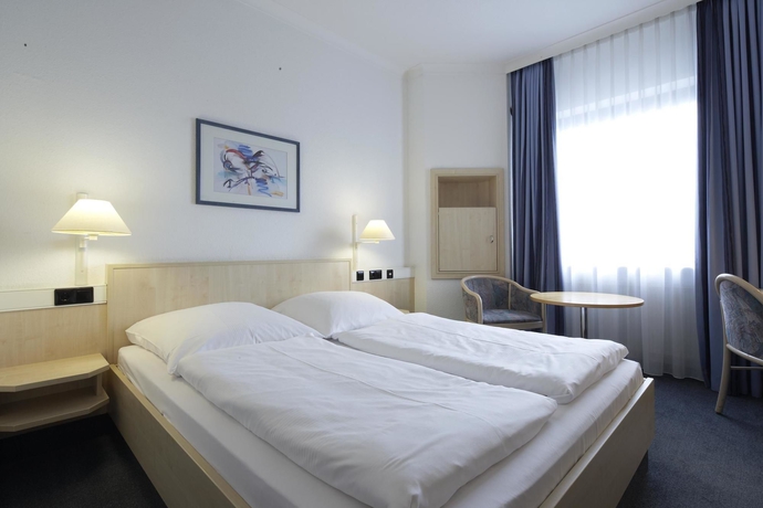 Imagen de la habitación del Hotel Intercityhotel Ulm. Foto 10
