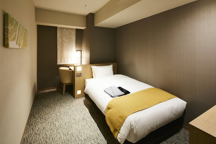 Imagen de la habitación del Hotel Intergate Hiroshima. Foto 18