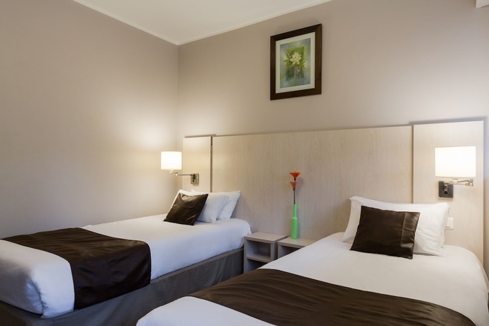 Imagen de la habitación del Hotel Inter-hotel La Dousseine. Foto 10