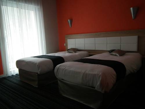 Imagen de la habitación del Hotel Inter-hotel La Roche-sur-yon Est Le Moulin Neuf. Foto 15