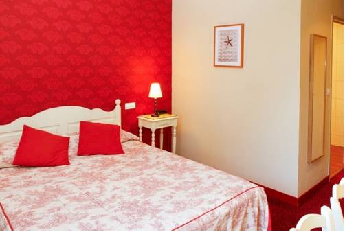 Imagen de la habitación del Hotel Inter-hotel Le Tréport Sud La Cour Carrée. Foto 11