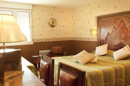 Imagen de la habitación del Hotel Inter-hotel Le Tréport Sud La Cour Carrée. Foto 15