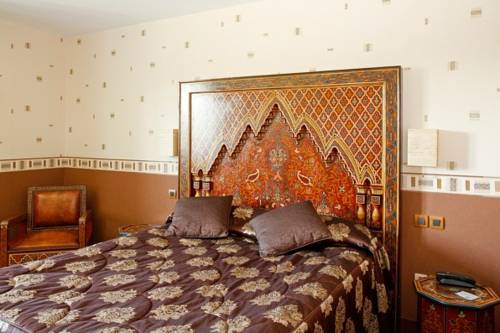 Imagen de la habitación del Hotel Inter-hotel Le Tréport Sud La Cour Carrée. Foto 16