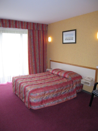 Imagen de la habitación del Hotel Inter-hotel Salers Le Gerfaut. Foto 5