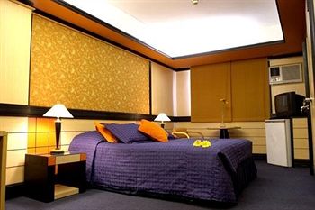 Imagen de la habitación del Hotel Internacional Asuncion Dowtown. Foto 7