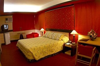 Imagen de la habitación del Hotel Internacional Asuncion Dowtown. Foto 8
