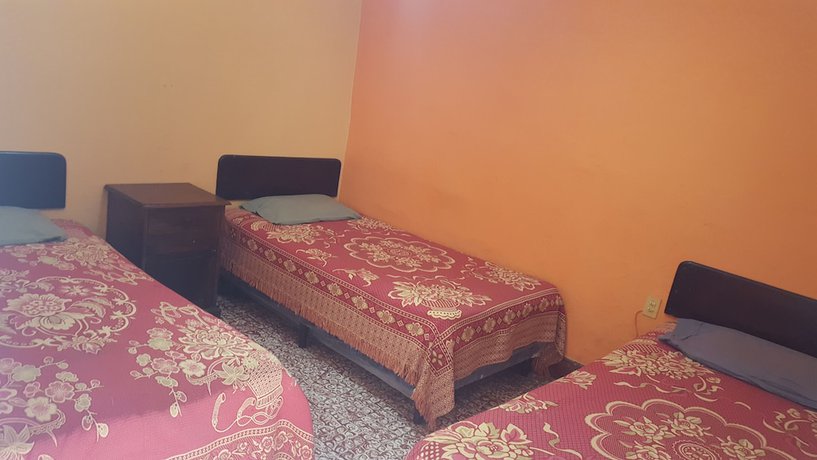 Imagen de la habitación del Hotel Internacional Guest House. Foto 4