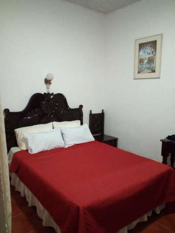 Imagen de la habitación del Hotel Internacional Guest House. Foto 5