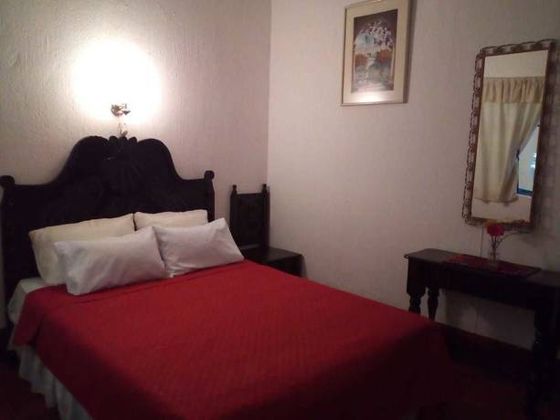 Imagen de la habitación del Hotel Internacional Guest House. Foto 12